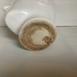 Man's head hide pot vase