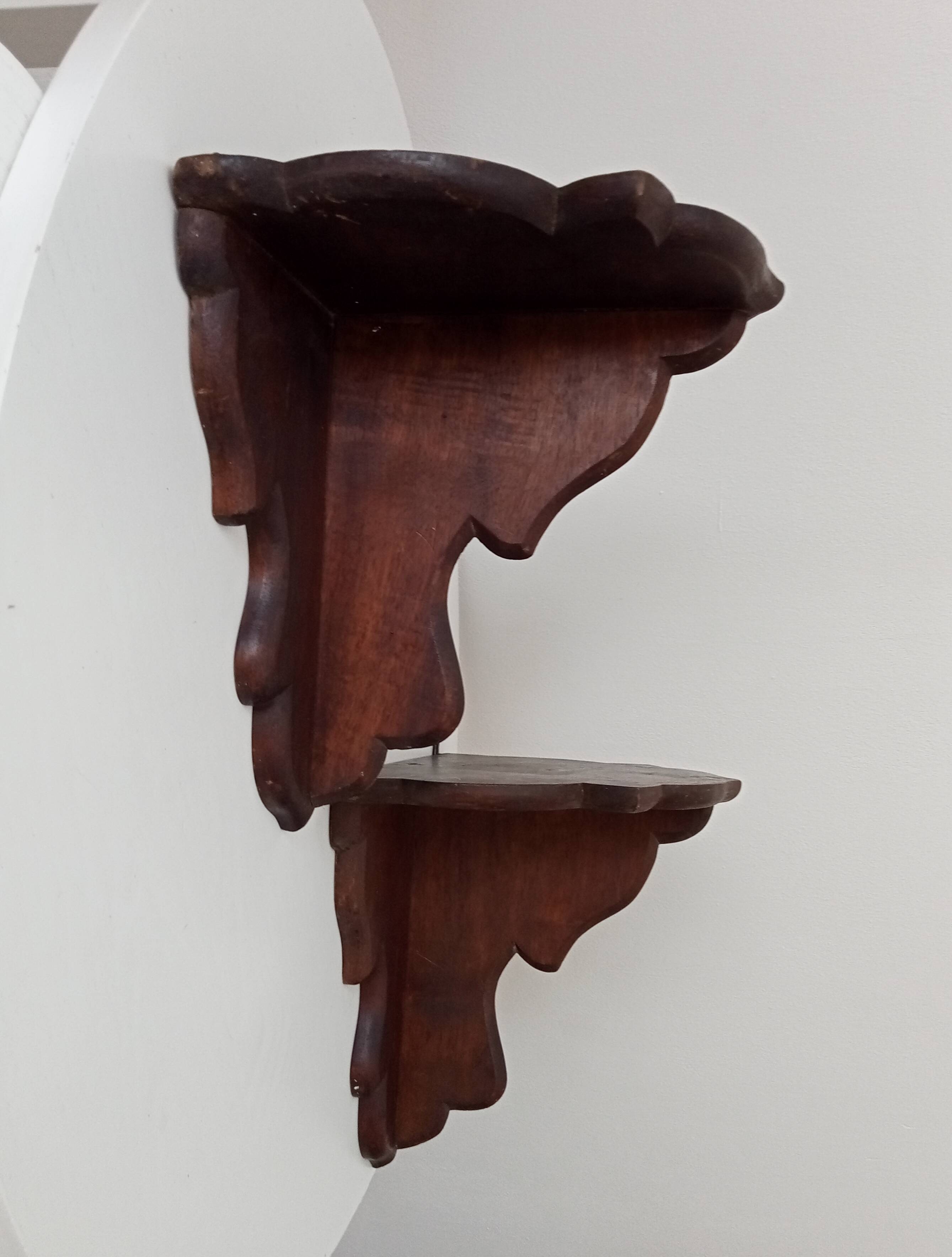 Pair of antique carved wooden shelves
