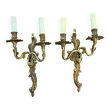 Pair of Louis XV Style wall lights in gilded bronze