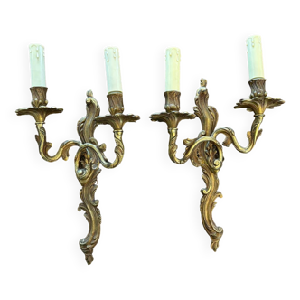 Pair of Louis XV Style wall lights in gilded bronze