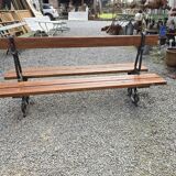 Antique double garden bench from the city of Paris in cast iron and wood