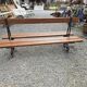 Antique double garden bench from the city of Paris in cast iron and wood
