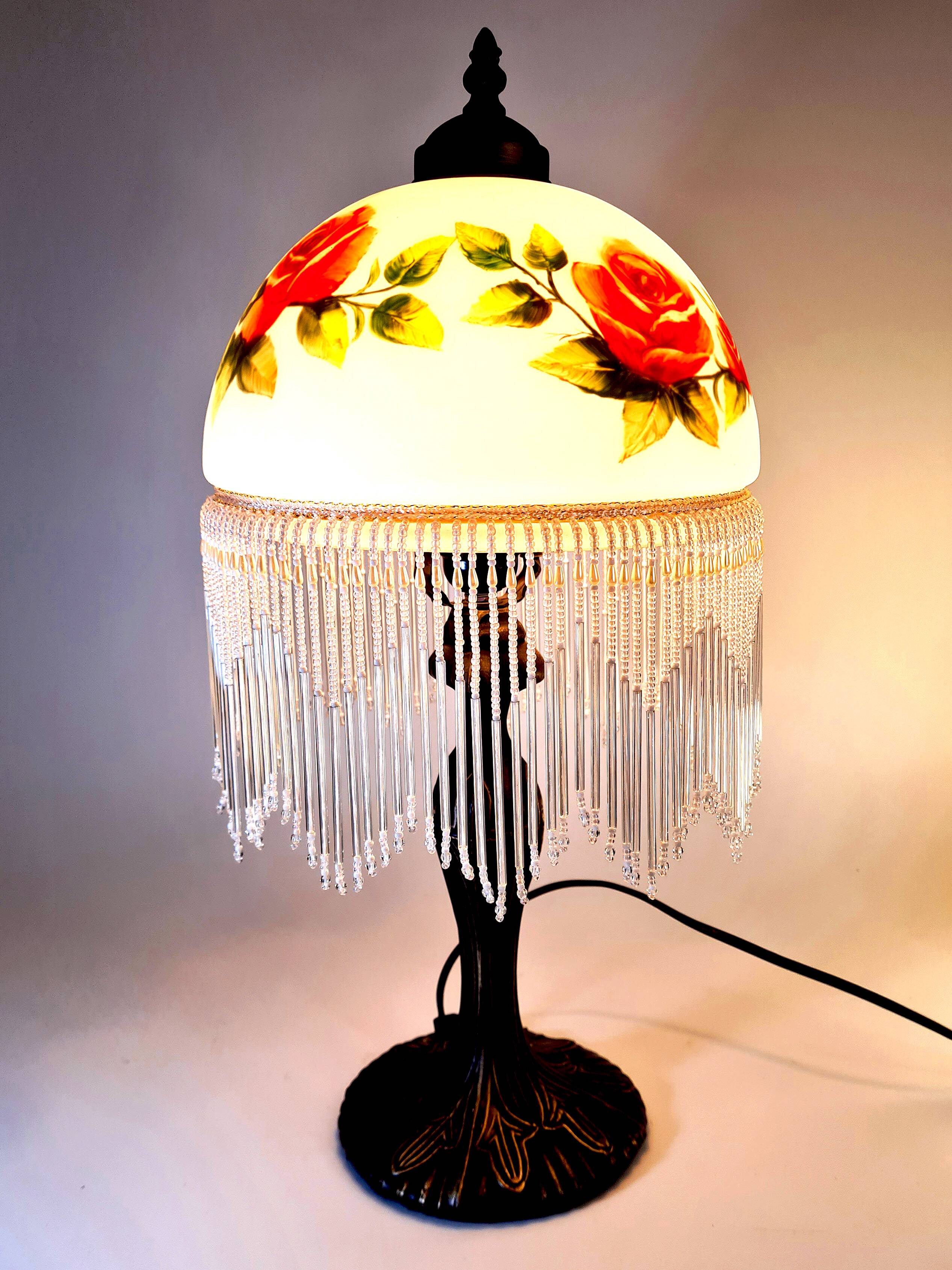 Vintage Tiffany-style fringed lamp with floral globe