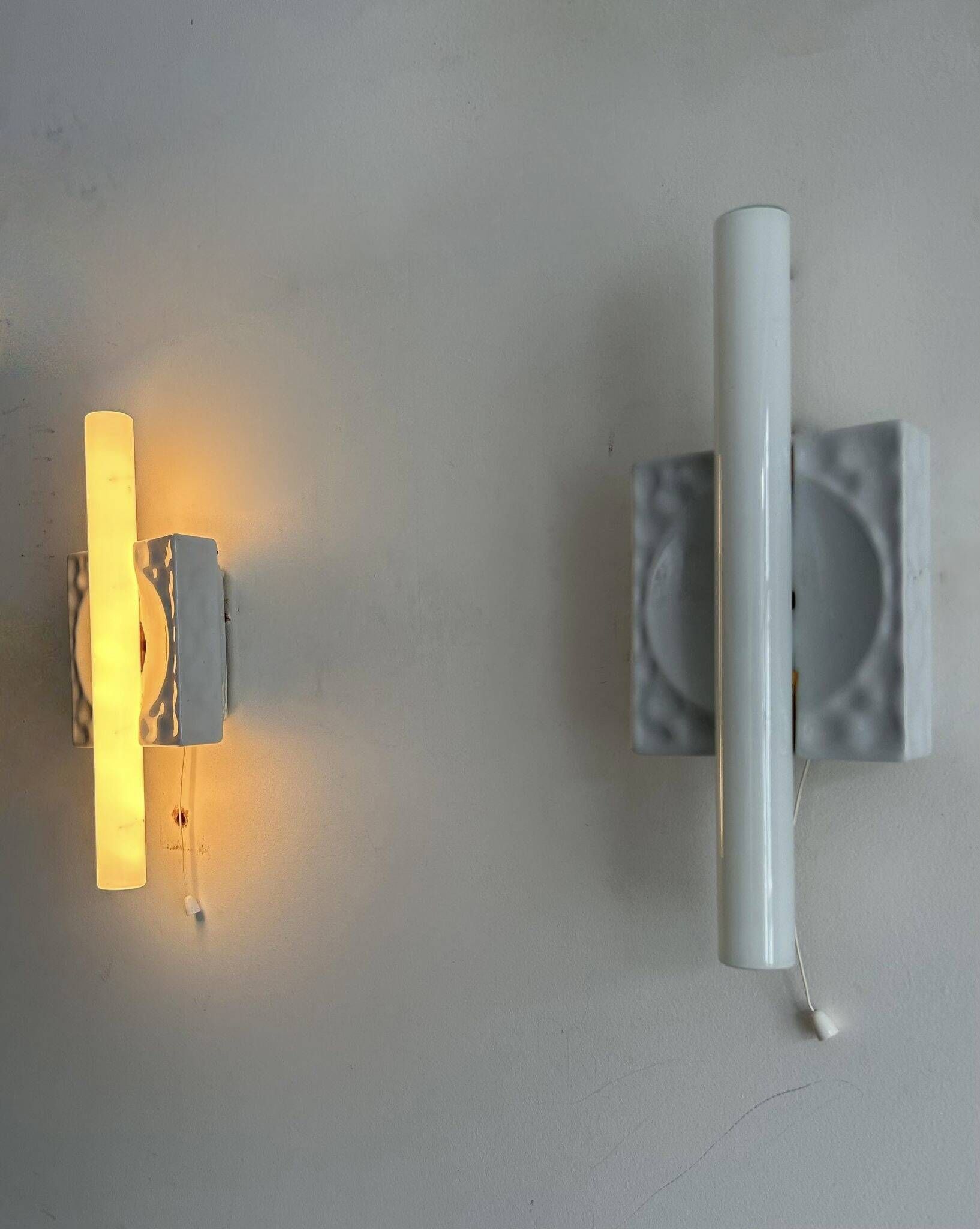 Pair of vintage porcelain wall lights with switch, France 1970.