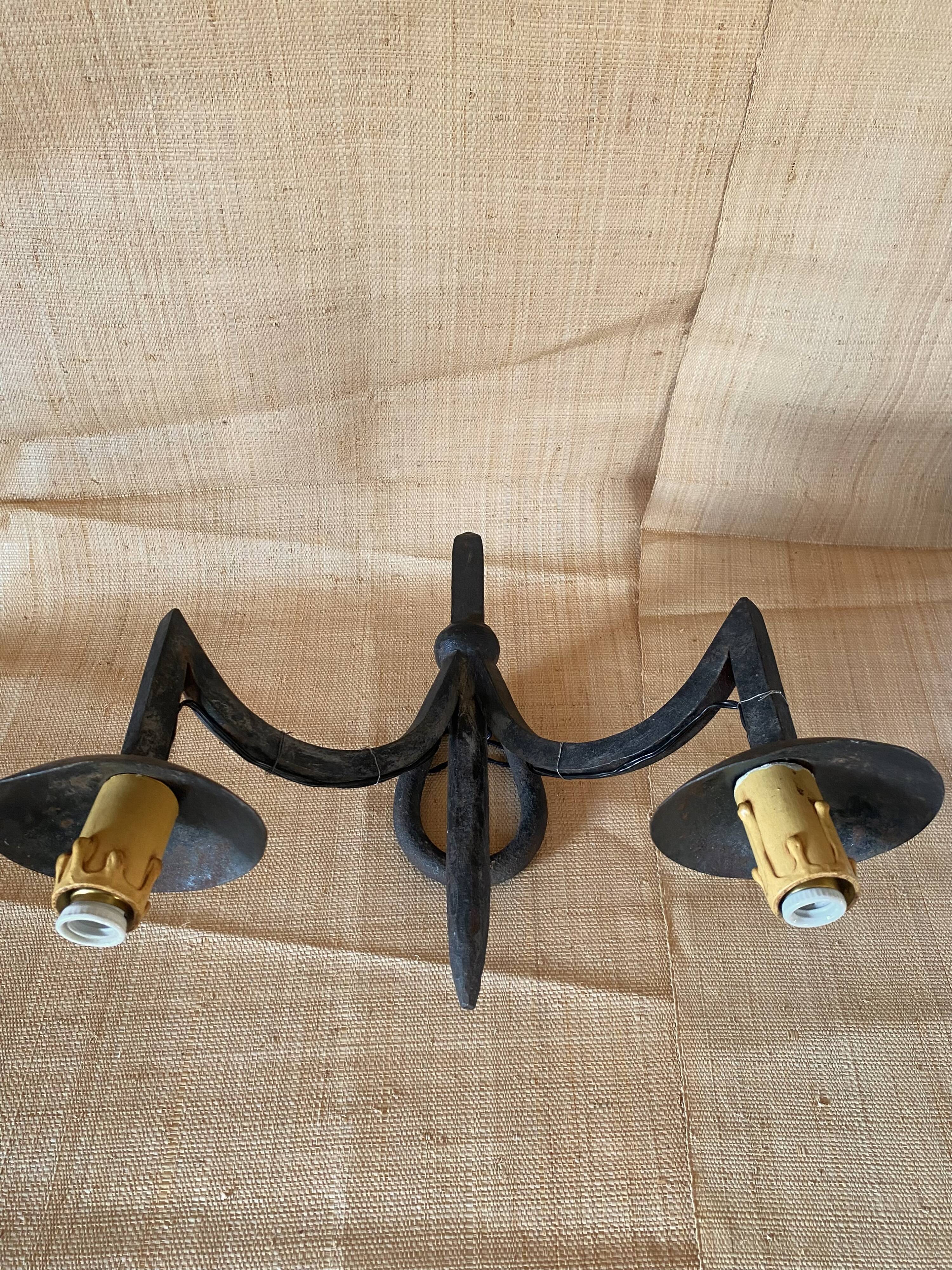 Wrought iron wall light with 2 lights