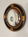 Witch's mirror in oak and ebony, England circa 1920