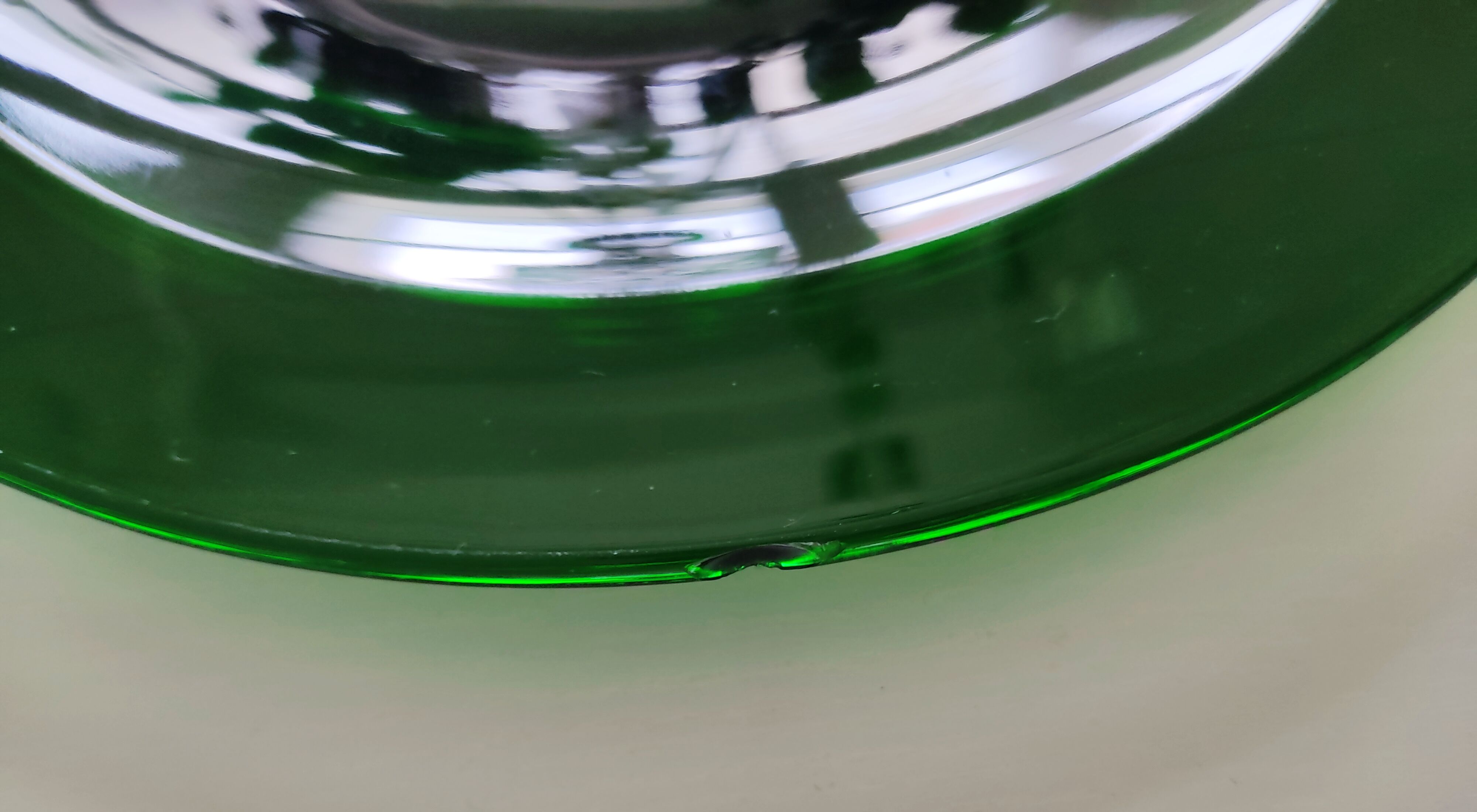 6 dishes in green glass