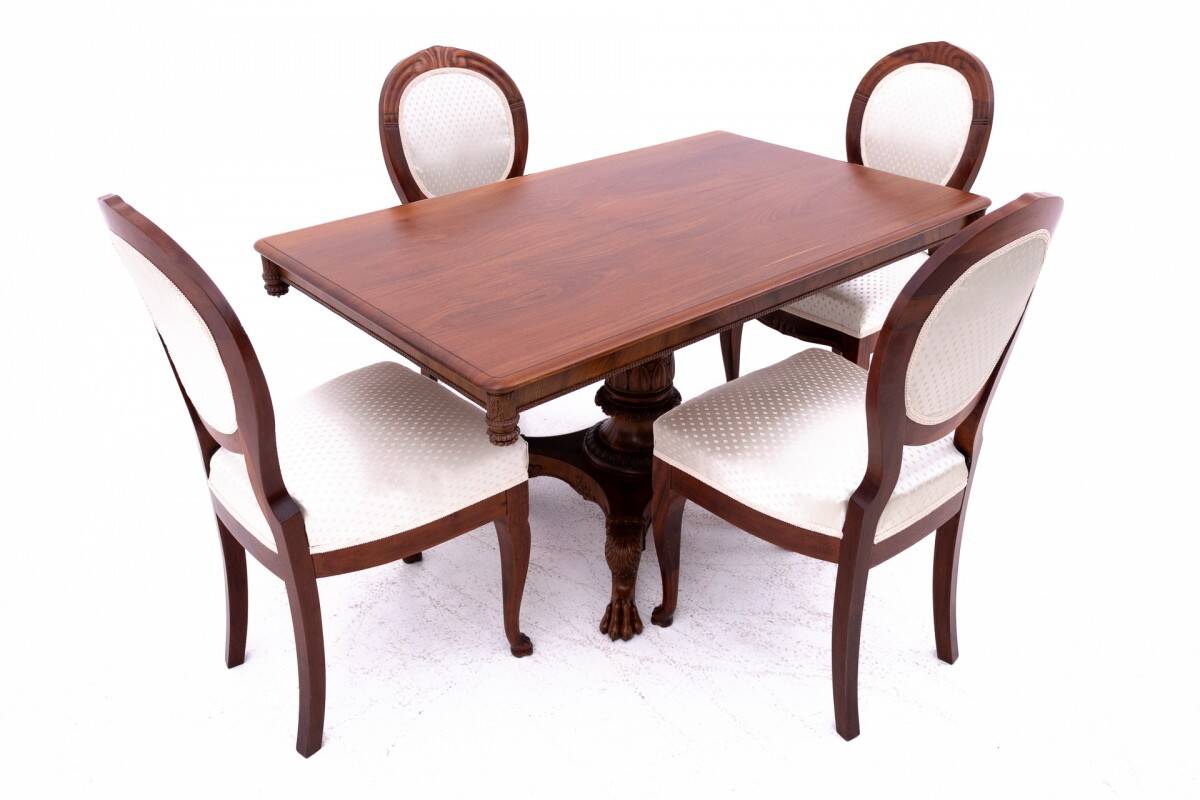 Late 19th century lion's paw table with chairs, Northern Europe.
