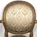 Carved and gilded wooden armchair in Louis XVI style, circa 1900