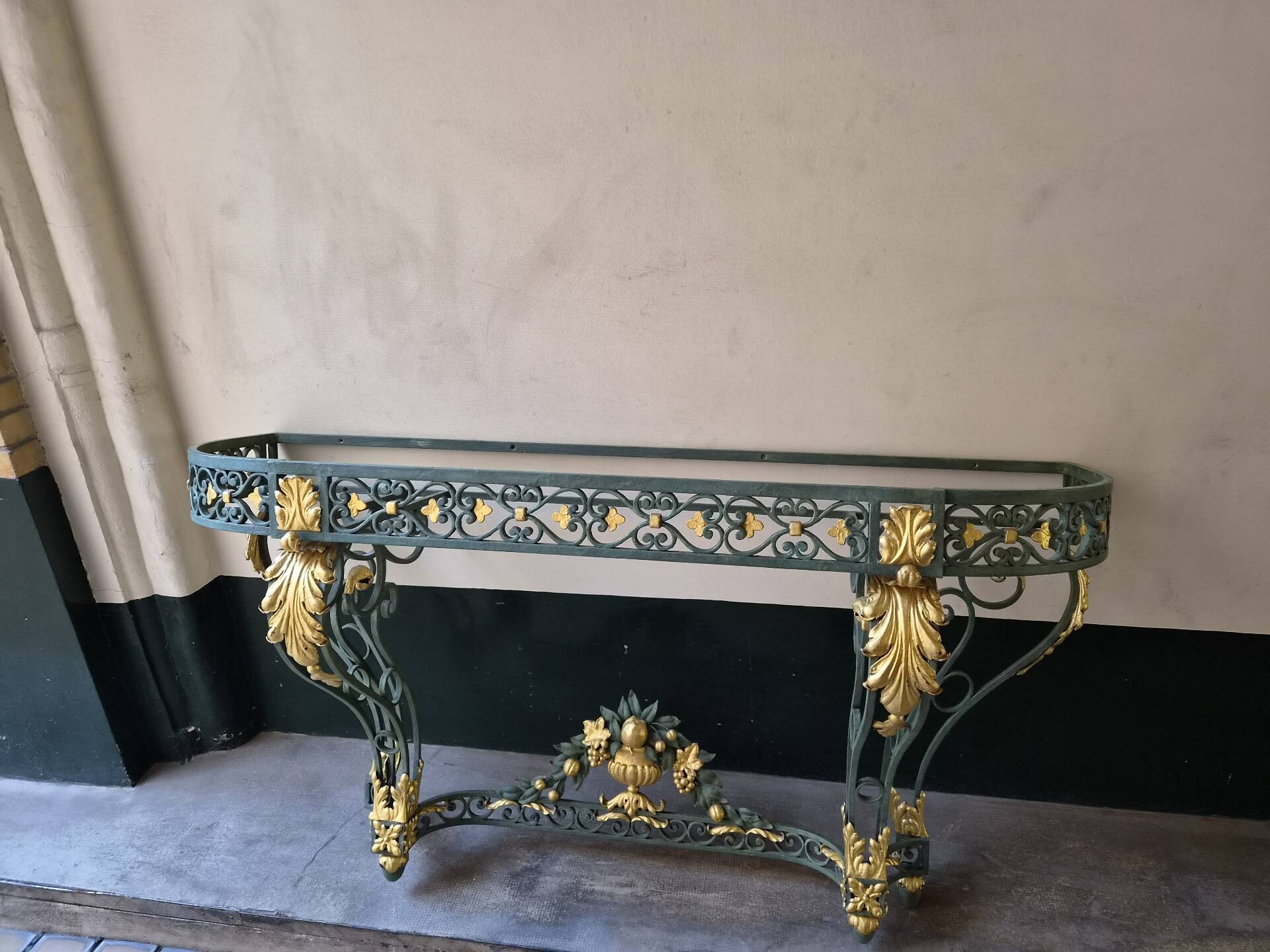 Wrought iron console in Louis XV style, 19th century.