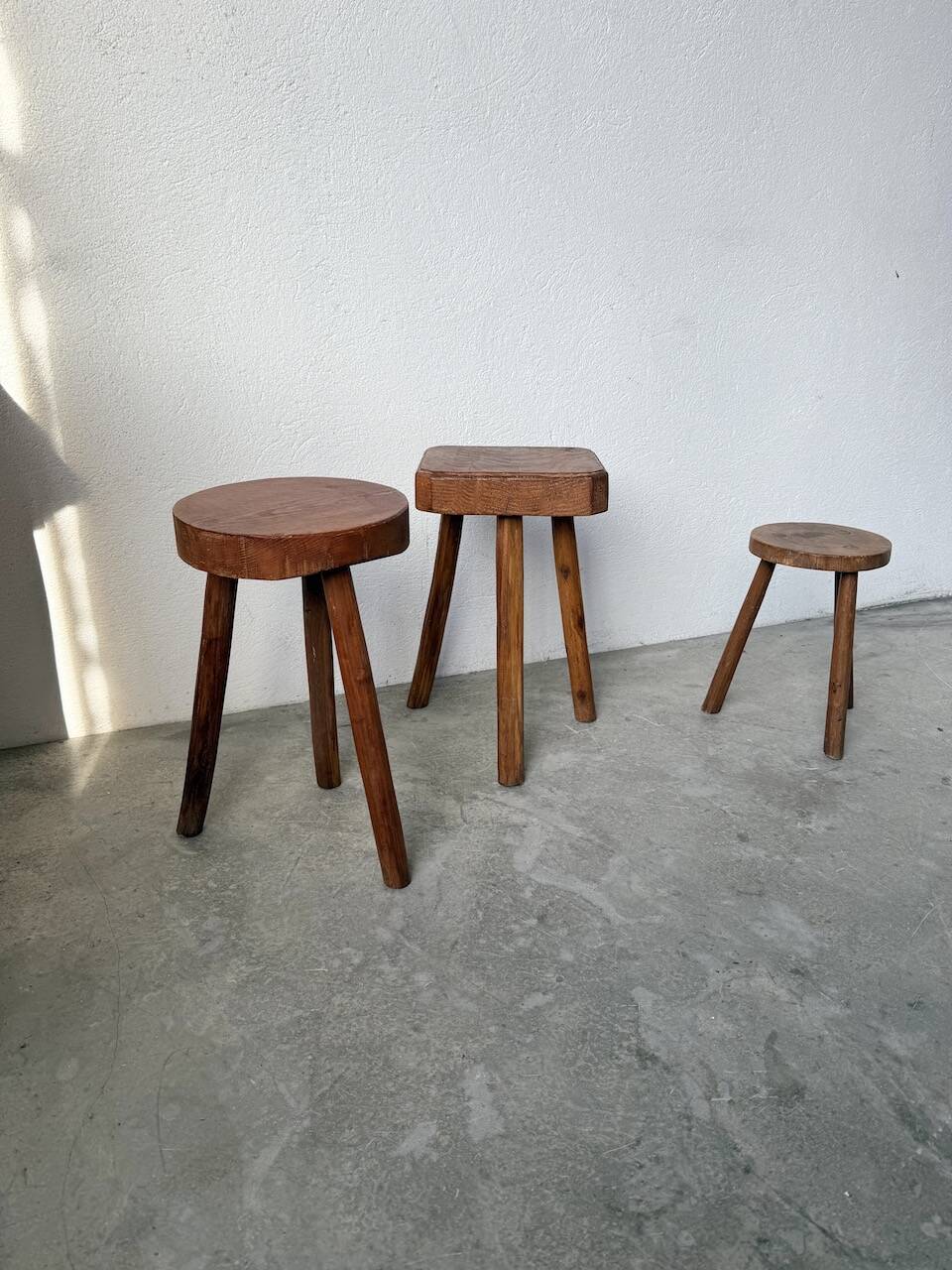 3 free-form oak tripod stools