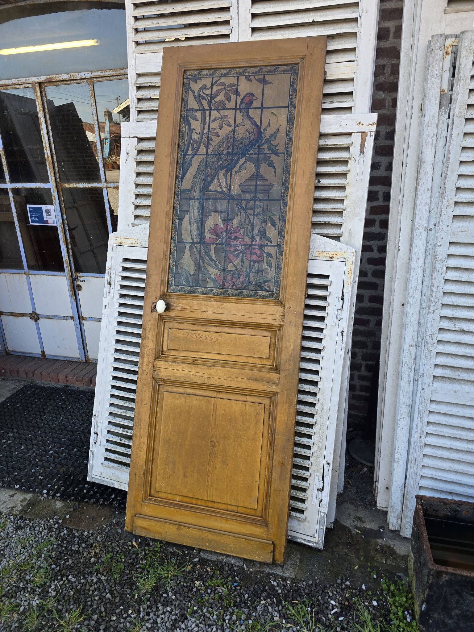 old door with decorated window