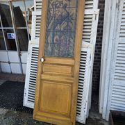 old door with decorated window