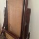 Folding wooden rocking chair and cannage from the 70s