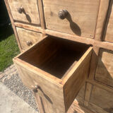 Beautiful piece of furniture with 8 drawers/2 doors in raw wood.