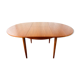 Expandable teak dining table, butterfly extension, circa 60s