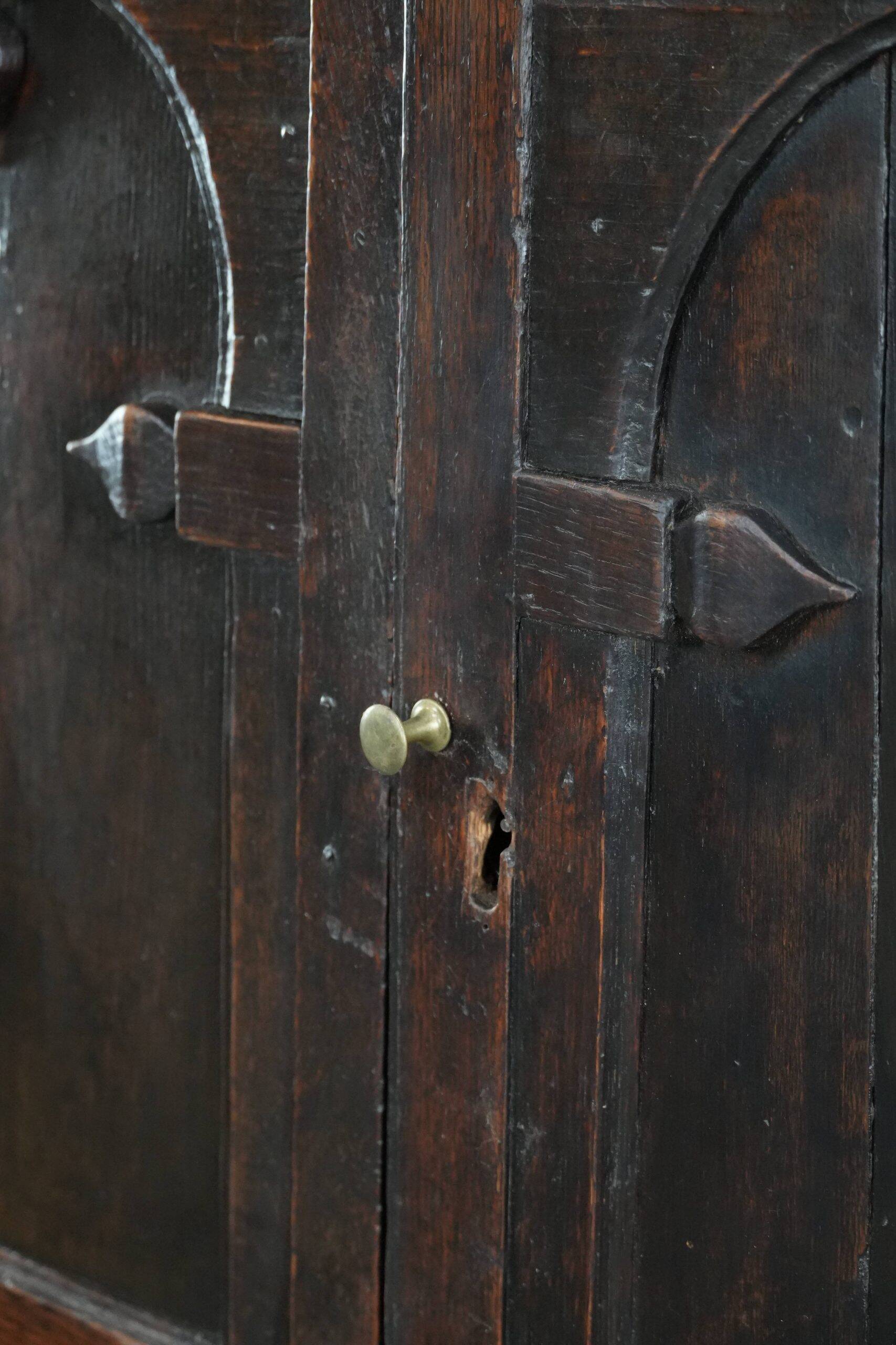 Unique antique English cabinet on stand made of oak from the 17th century