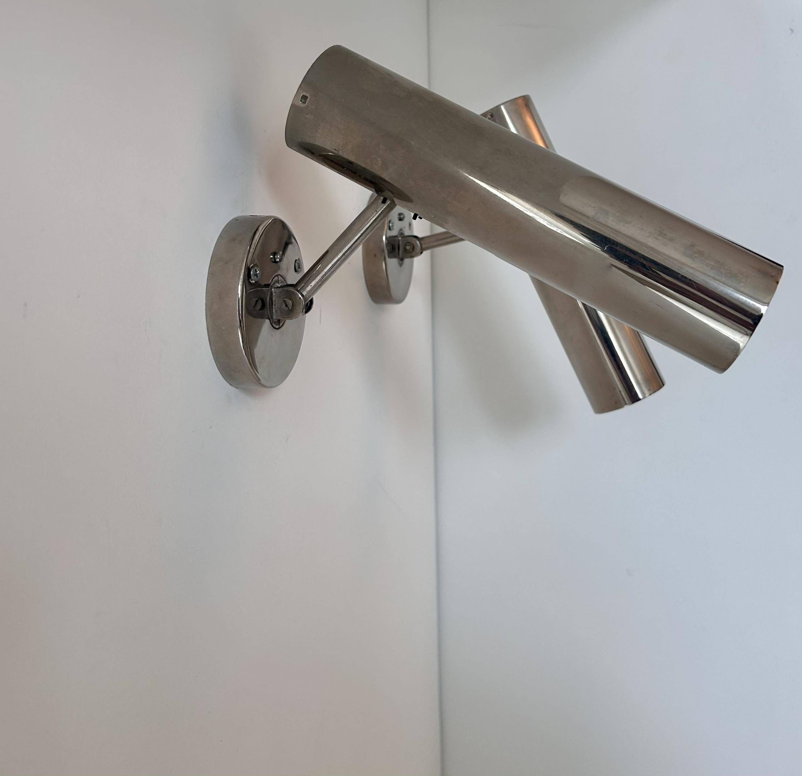 Pair of modernist adjustable wall lights, chrome metal, France 1960