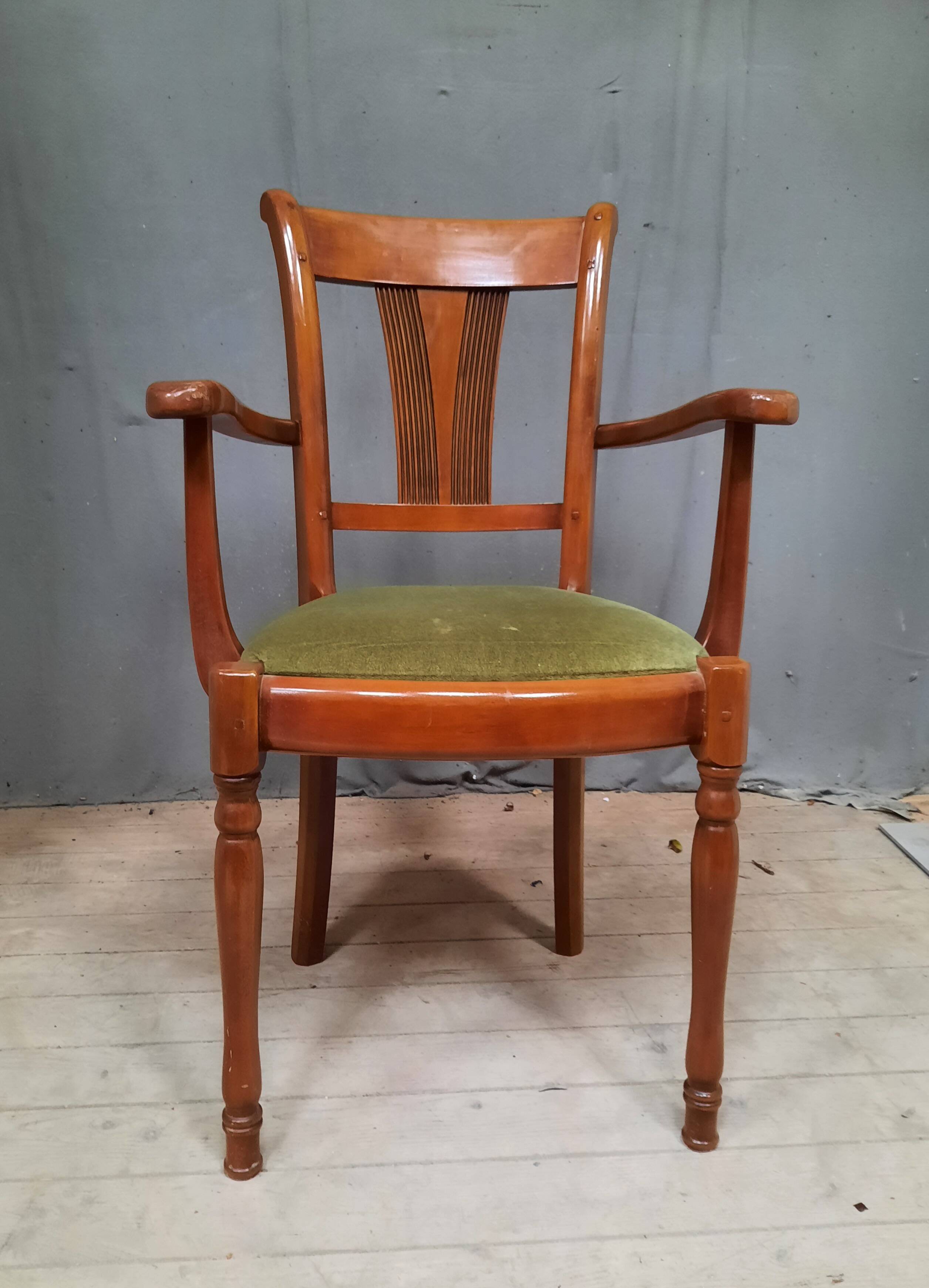 Modern armchair in varnished wood