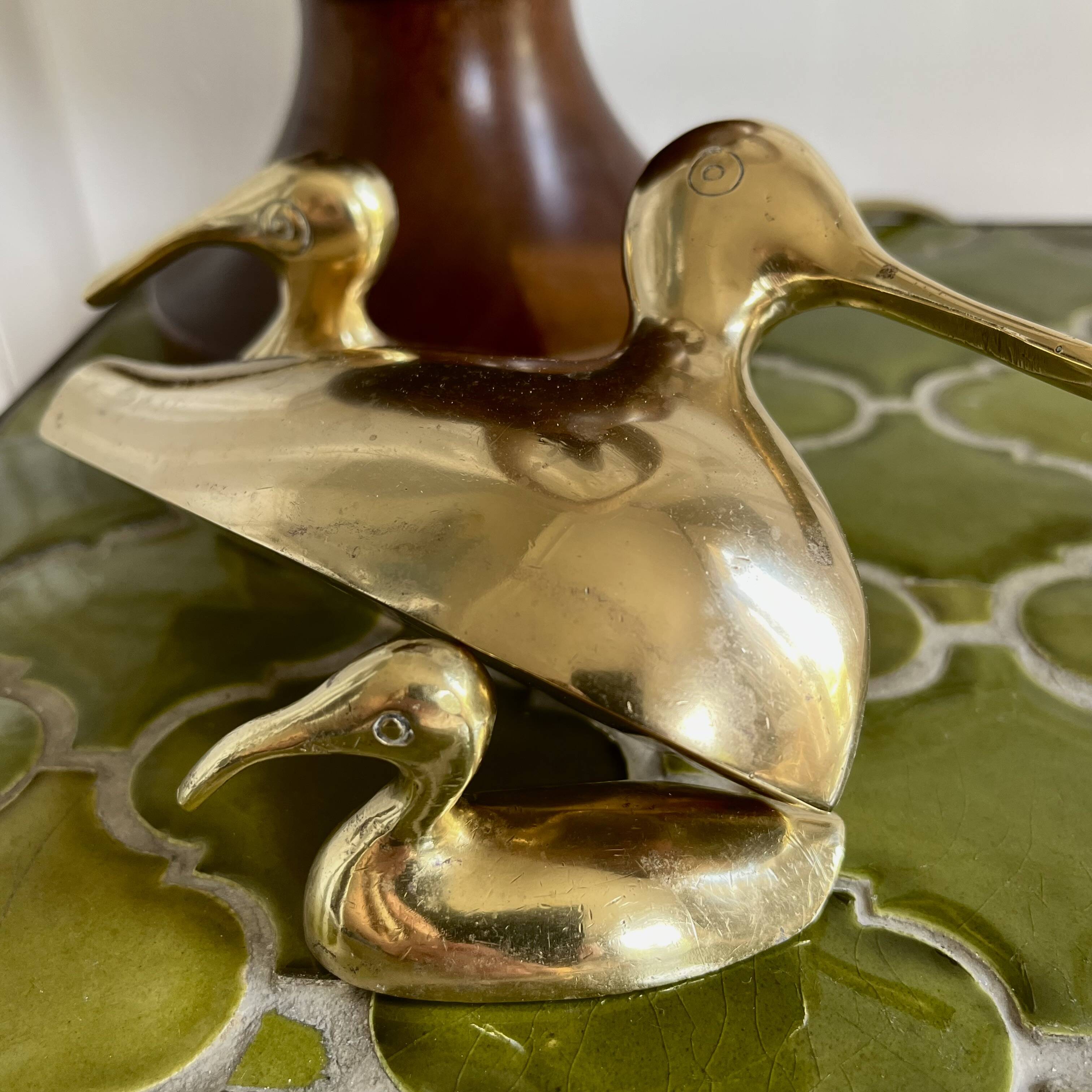 Three brass ducks from the 1950s