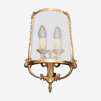 Wall lamp double fires, baroque, gilded bronze and convex glass 1950