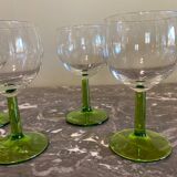 4 green stemmed glasses