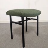 Modernist driver of the 50s/60s and her ottoman