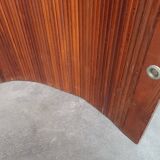 Undulating slatted screen