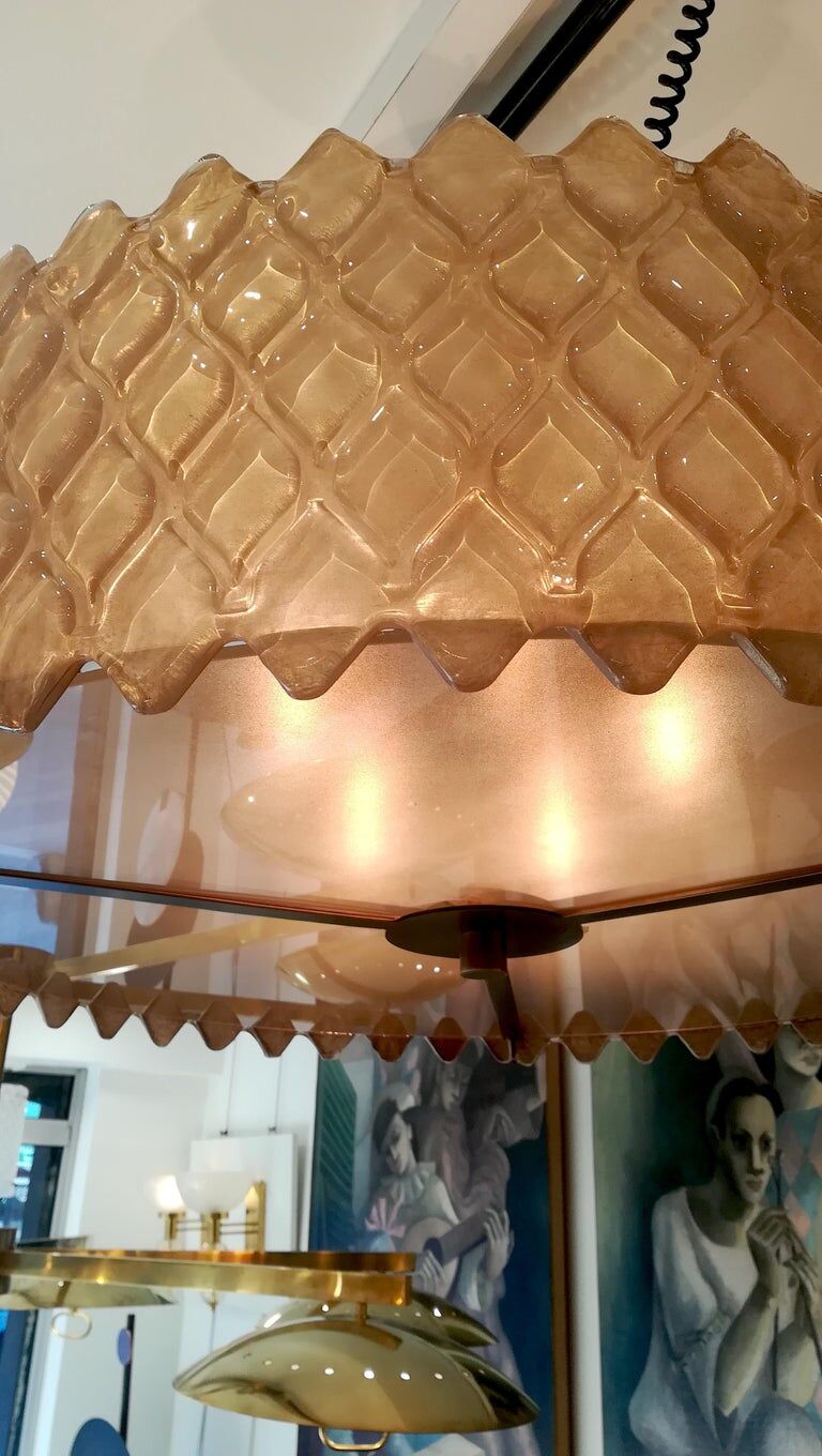 Patinated brass lurstre, and Murano glass