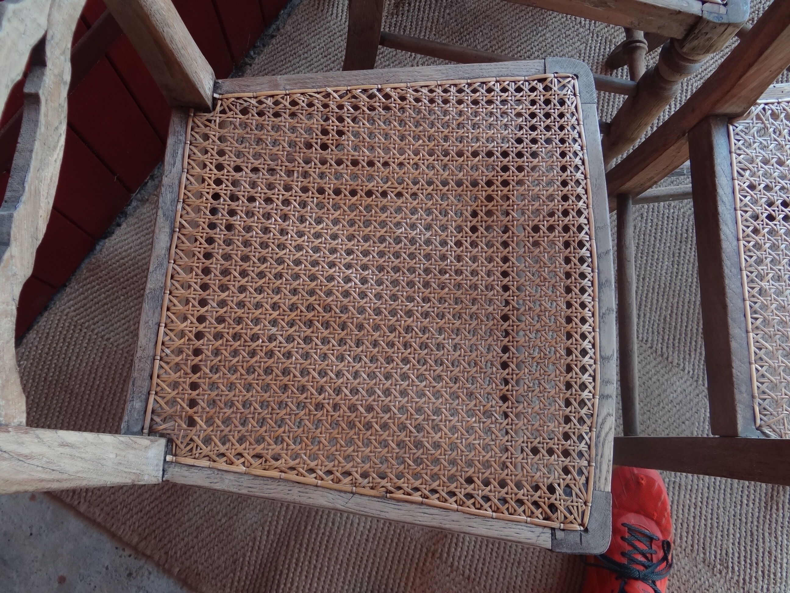 Suite of oak chairs; canated seats