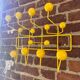 Hang It All yellow edition by Charles Eames and Ray Eames for Vitra