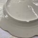 Plate and its golden ravier rim