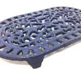 Dessous de plat bleu en fonte