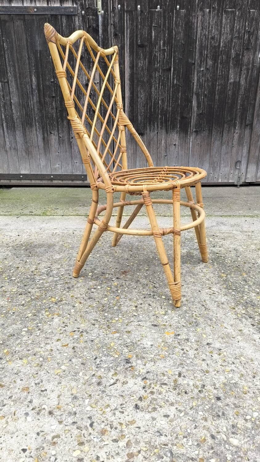 Rattan chair by Louis Sognot 1960