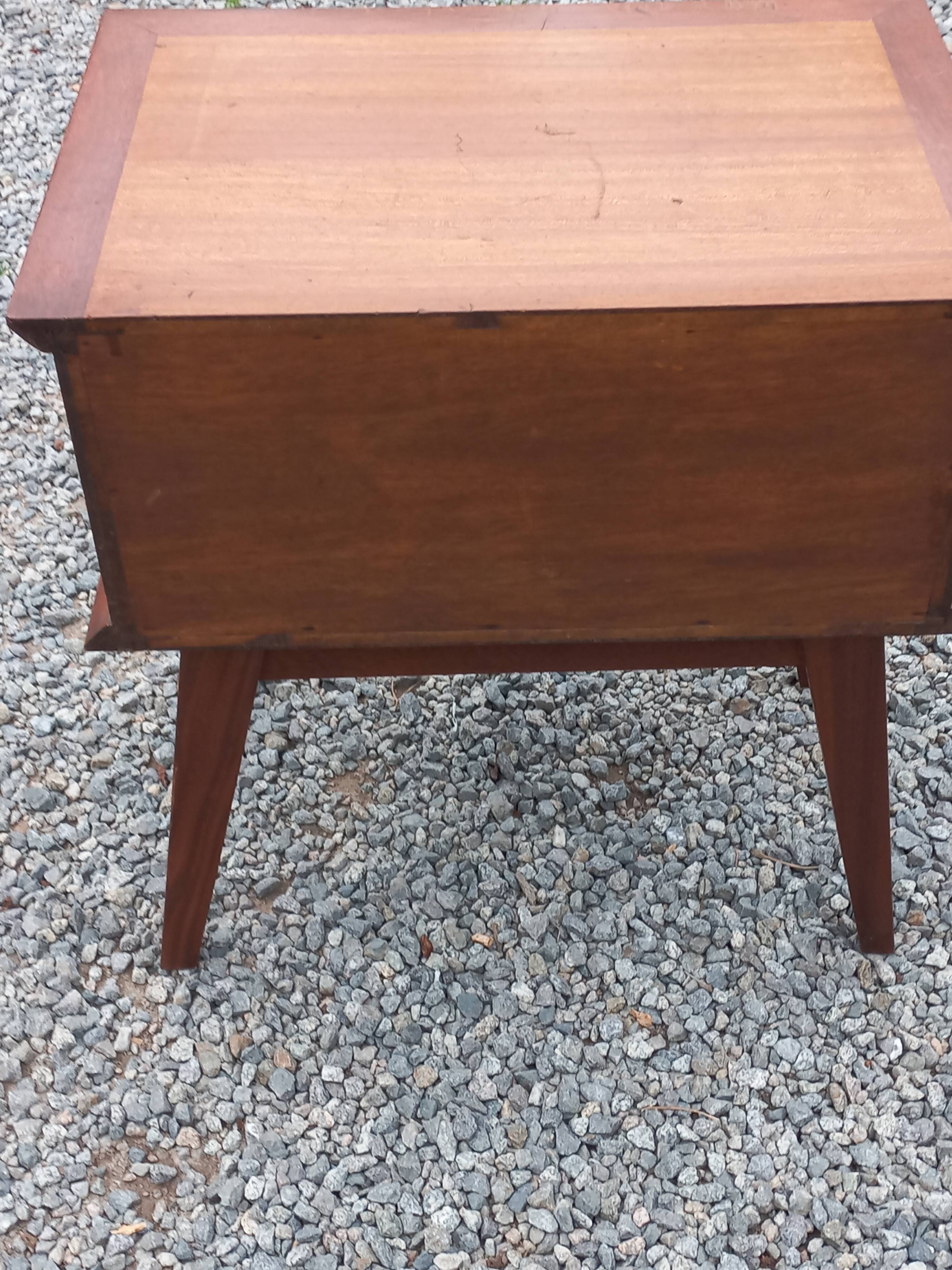 Vintage bedside table with compass legs from the 50s