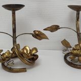 Pair of brass candle holders decorated with patinated metal flowers