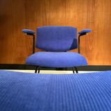 Vintage armchair and its footrest from around 1950.