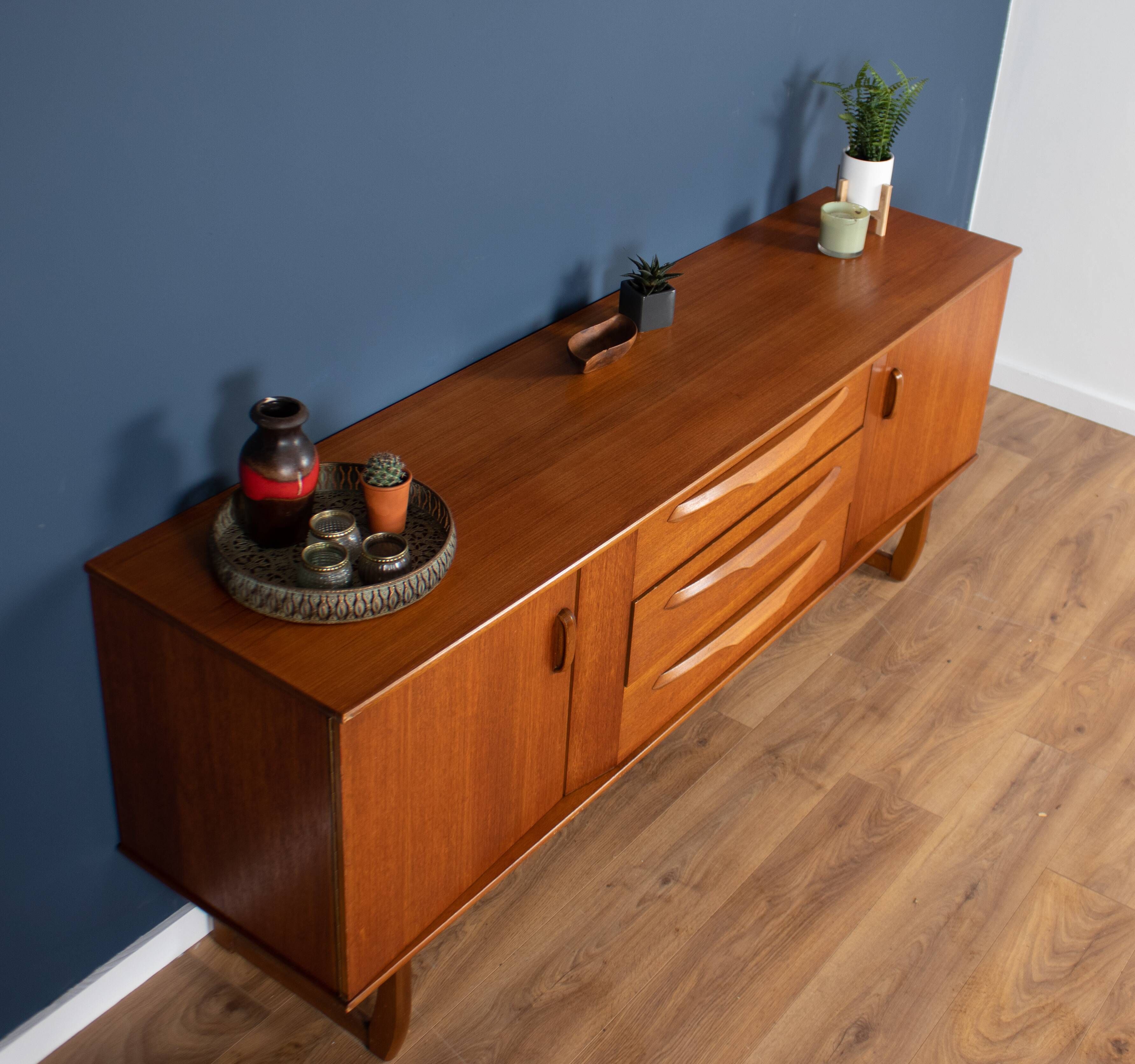 Teak 1960s sideboard with sleigh legs