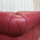 Chesterfield 2-seater leather sofa, modern production from the 2000s.