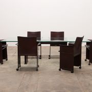 Tito Agnoli for Matteo Grassi leather dining table and six chairs