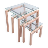 Trois tables gigognes des années 90 en métal peint et verre trempé