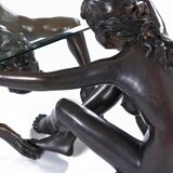 Bronze figural sculpture coffee table with glass top by C. Conndray