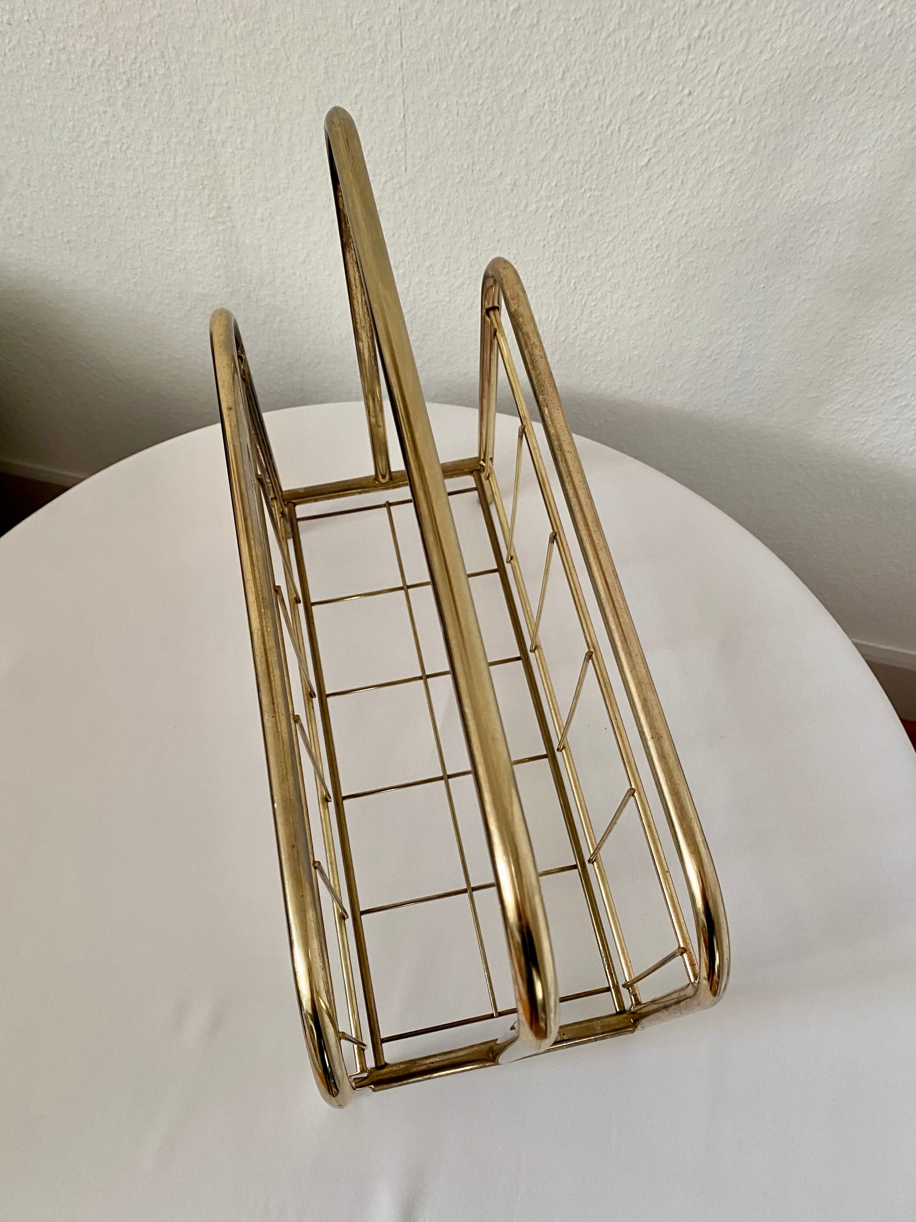 Gilded metal magazine door