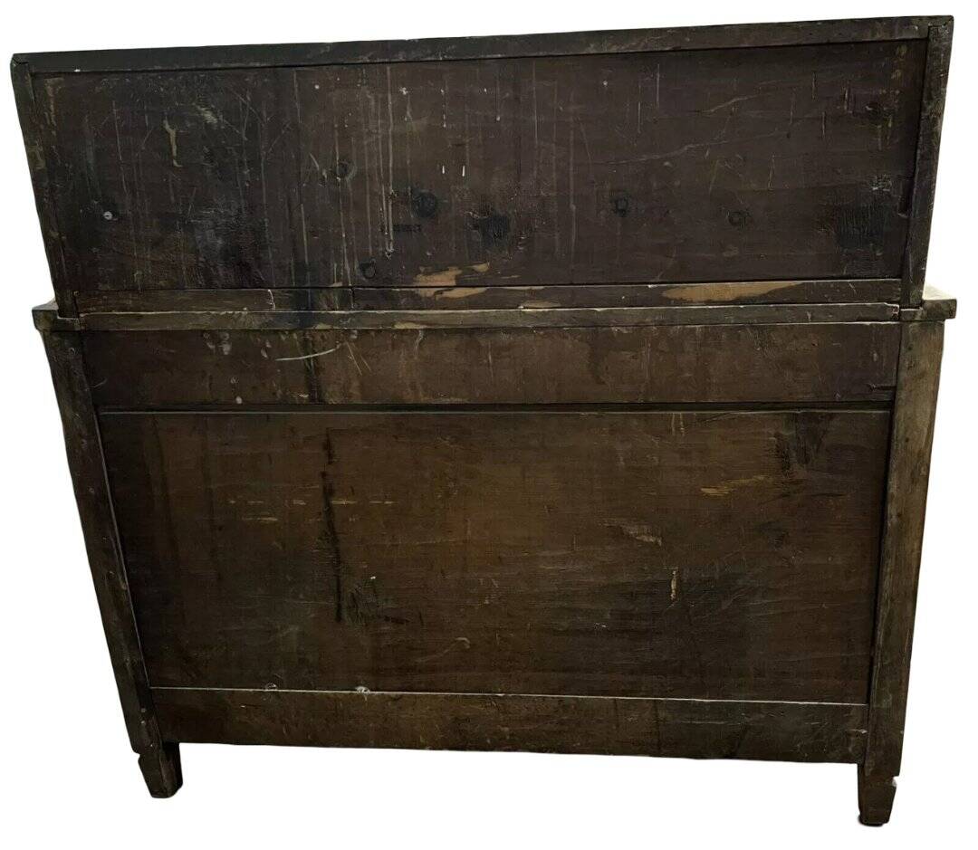Commode scribanne from the Louis XVI period in walnut burl with marquetry decoration.