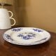 Round dish in Tournai porcelain, Boch Frères, fly decoration