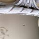 Louis XVI style patinated oval mirror