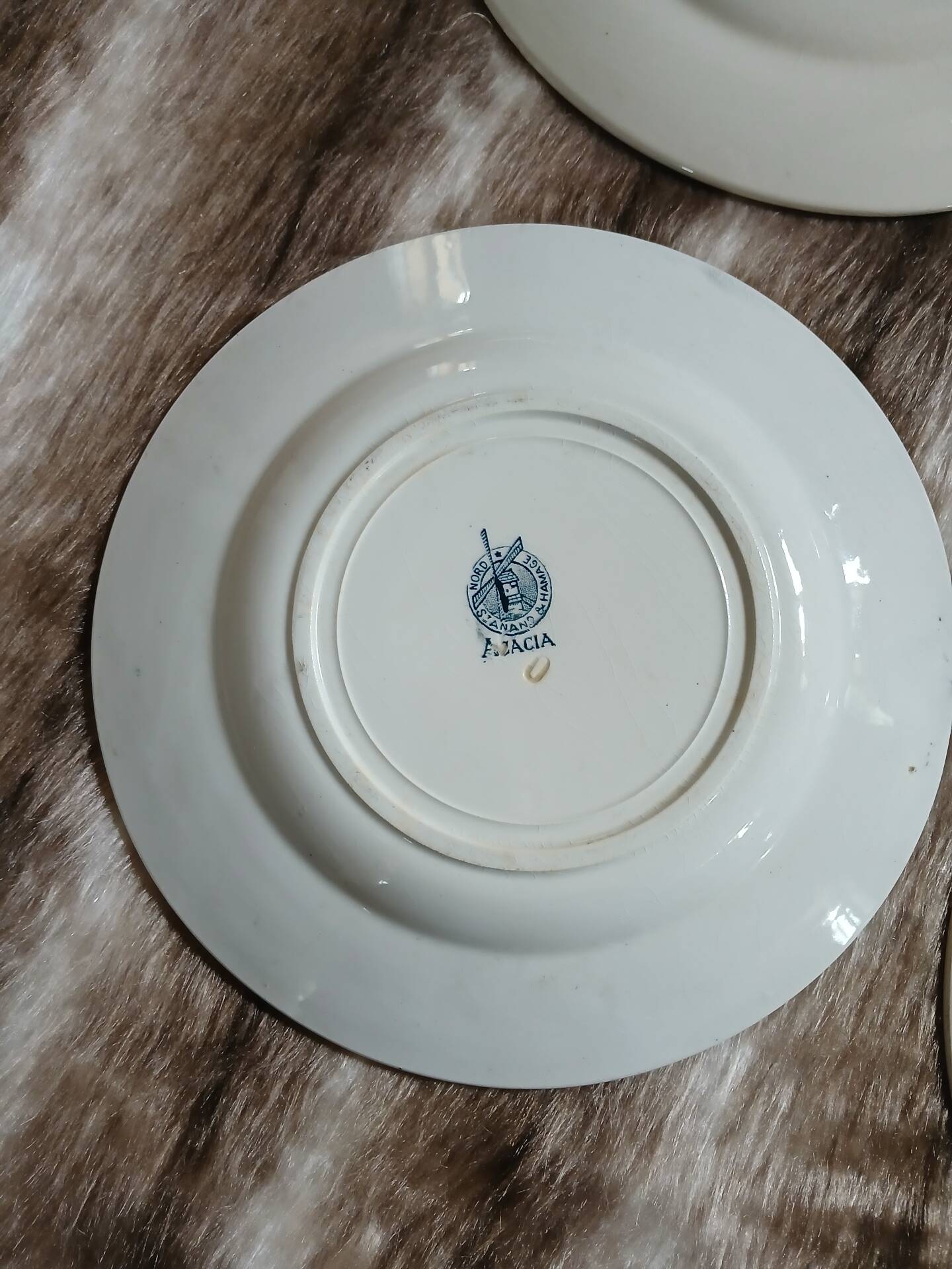 8 mismatched ironstone dinner plates