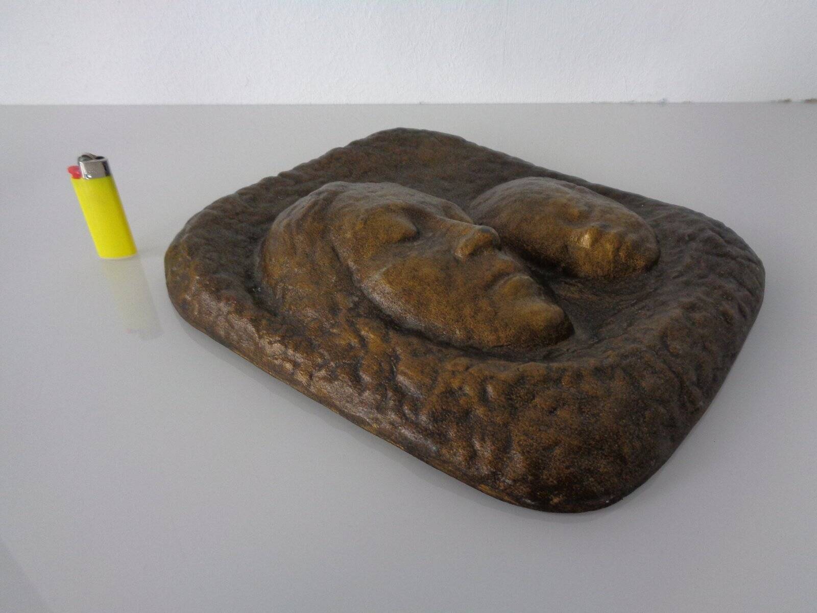 German bronze relief of mother with baby, 1940s.