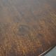 Round antique English oak tilt-top table with wonderful colors