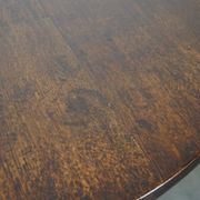 Round antique English oak tilt-top table with wonderful colors